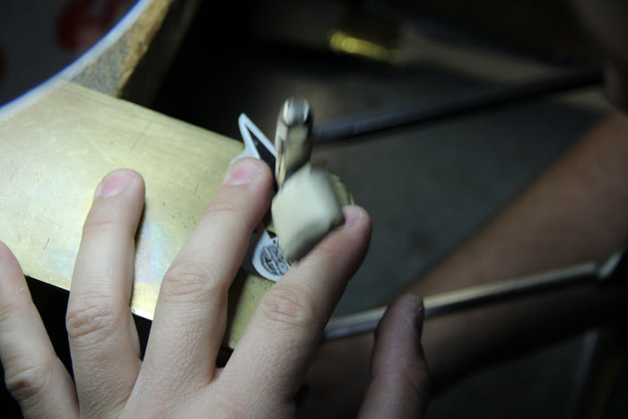 Moon and Lola production of hand-drawn hand-cut fine metals