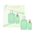 Kayali perfume set with four bottles and packaging on a light green background